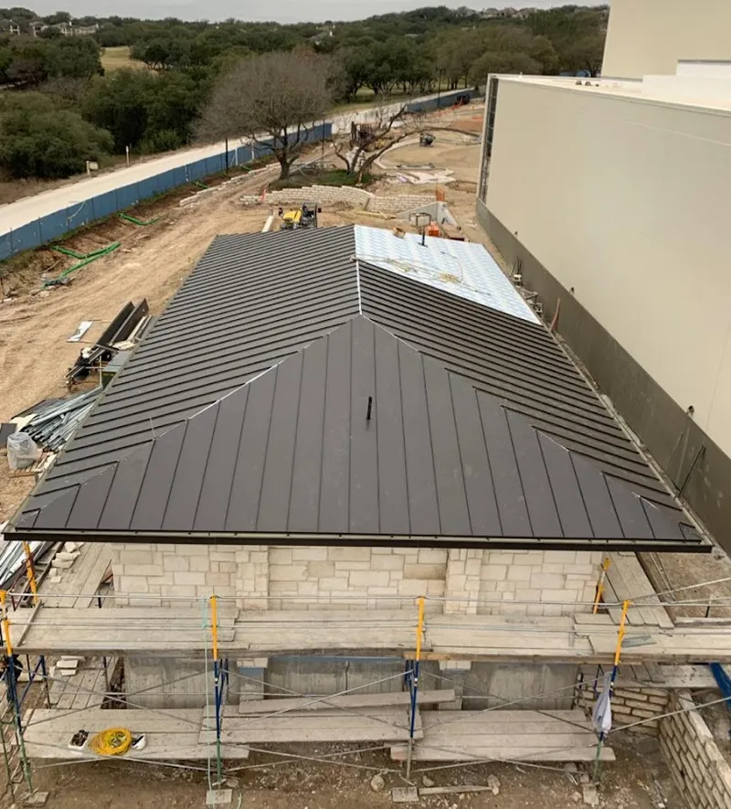 Metal roof new construction with scaffolding in San Jose