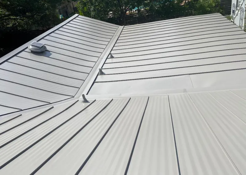 Solar attic fan installed on a metal roof for Roof Ventilation in San Jose